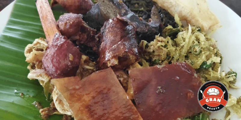 Lechona tolimense casera, receta con arveja y piel crocante